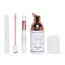 A cleanser foam kit for the eyes, featuring a white bottle with a pink cap and applicator. The product is designed to gently cleanse and care for the delicate eye area.
