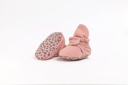 Soft, pink baby shoes with a bow detail and leopard print pattern. Suitable for infants aged 0-24 months.