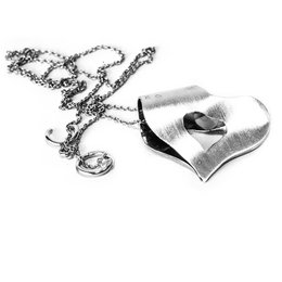 Polished, matte, or golden plated heart-shaped pendant necklace with a heart-shaped cutout design.