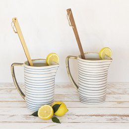  Cylindrical ceramic vase with horizontal stripes, wooden handle, modern minimalist design, gray and blue variants available.