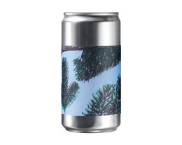 A can of soda with a snowy alpine forest scene printed on the label.