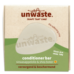 Orange-scented conditioner bar with shea butter, nourishing and protecting hair.