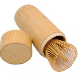 Bamboo storage tube for matcha beater, cylindrical shape, natural material, suitable for storing and protecting matcha whisk.