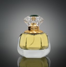  Floral, feminine eau de parfum for women in a crystal glass bottle with a gold cap.