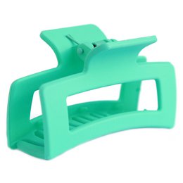  Mint green plastic hair clip with a straight, simple design. Suitable for holding back hair.