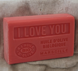  "Organic olive oil soap bar with 'I Love You' text"