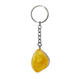  Citrine key ring with a tumbled stone in a yellow and orange color. The stone has a natural, irregular shape and is attached to a metal keychain ring.