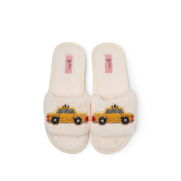  Pair of brooches featuring yellow NY taxi cabs, embroidered design, cream and pink plush slippers.