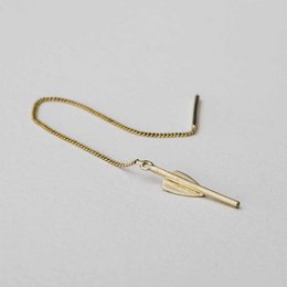 Elegant gold-toned statement earrings with a sleek, minimalist design. The earrings feature a long, thin bar-shaped pendant that hangs gracefully from a delicate chain.