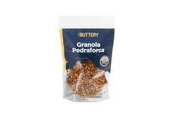 Granola with a crunchy, nutty texture made with oats, nuts, and seeds. Packaged in a resealable bag for freshness.