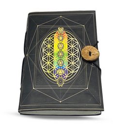 A 15 x 10 cm journal with a colorful Flower of Life design on the cover, featuring a geometric pattern and chakra symbols. The journal has a black background with a lock closure.