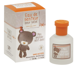 Eau de senteur 50ml, a perfume product with a teddy bear design. The product features a brown teddy bear, an orange bottle, and a white and orange box.