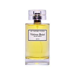 Vetiver Boisé is a woody, earthy eau de toilette with notes of vetiver, amber, and sandalwood. The bottle features a simple, elegant design with a clear glass body and a silver cap.