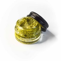 Glitter gel in a gold color, packaged in a small jar with a black lid. The gel has a shimmery, sparkly appearance.