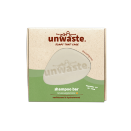 Solid shampoo bar with orange oil, suitable for all hair types.