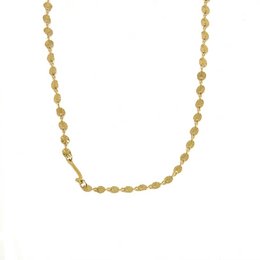 A gold-colored necklace with circular pendant charms, featuring an initial "J" charm in the center.