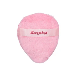 A soft, pink powder puff from Boozyshop. This multi-use puff is perfect for applying makeup, blush, or setting powder. Its fluffy, plush texture provides a smooth, even application.