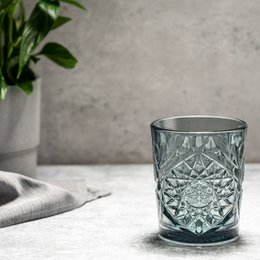 Set of 6 green glass longdrink glasses with hobstar pattern design. Glasses have a capacity of 355 ml and are sold in a box of 6.