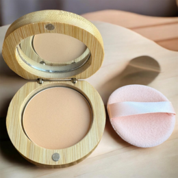  Compact powder with natural beige finish, wooden round case, matte texture, includes applicator puff, eco-friendly packaging