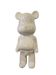  A white ceramic bear figurine measuring 22cm in height. The bear has a simple, minimalist design with a smooth, glossy finish.