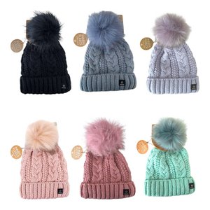 Knitting hat for women »Feeded winter hat with fleece» bobble cap »ladies cap with a cable pattern