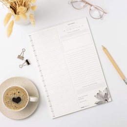 A low-stimulus A4 daily planner with a 'Lotus' writing pad design, featuring a minimalist and calming aesthetic suitable for daily organization and planning.