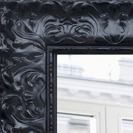Baroque-style black mirror with ornate frame, suitable for wall decor in living room or bedroom. Dimensions available in multiple sizes.
