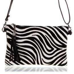 Zebra-patterned leather handbag with tassel detail, available in black and white colorways.