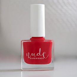 Vibrant red nail polish with a glossy finish.