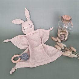 Soft, cuddly beige rabbit plush toy with a sweet expression. Made of hydrophilic material, perfect for snuggling. Includes a glass jar filled with decorative elements.