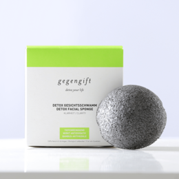 Konjac sponge, a natural exfoliating tool made from the konjac plant, with a gray, porous texture.