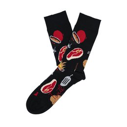 Black socks with red and white abstract shapes or patterns.