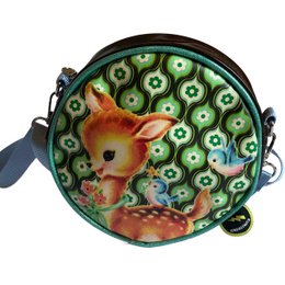  Shoulder bag with a round shape, featuring a deer design in green and orange colors, and a zipper closure.