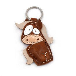 Leather animal keychain with a cute Icelandic horse design. Features a brown leather body with stitched details and a metal ring for attaching to keys or bags.