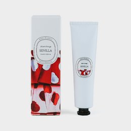 Natural hand cream with orange bitter fragrance from the Seville Collection. Moisturizing and nourishing formula in a red and white patterned tube.
