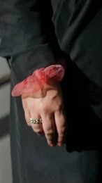 A silver-colored ring with a chunky, textured design. The ring has a bold, statement-making appearance and is suitable for everyday wear.