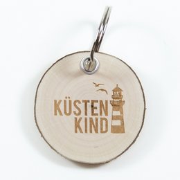 Coastal-themed keychain with "Küstenkind" (coastal child) text in gold.