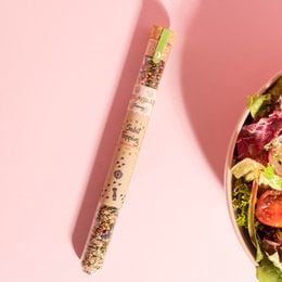 Salad topping, a blend of dried herbs and spices, including oregano, basil, and garlic, for adding flavor to salads.