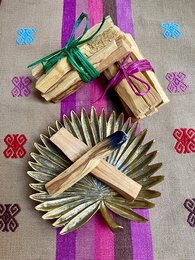 Palo Santo wood sticks, 50 grams, natural incense made from sustainably harvested Palo Santo wood. Includes wooden matches and a decorative holder.