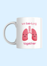 "Whimsical mug with a playful lung design and the text 'We be-lung together'. Suitable for coffee or tea lovers."
