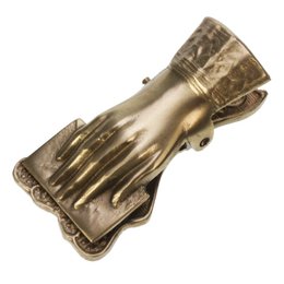  A gold-colored metal hand clip with a letter design, suitable for holding cards or documents.