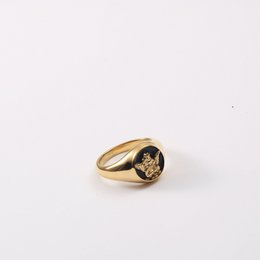 Kiki - Carved Angel Baby Black Enamel Signet Ring