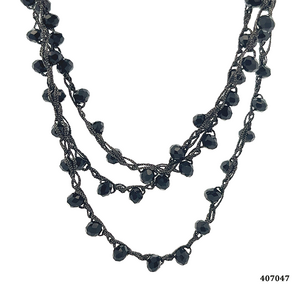 Lange Häkelkette mit Kristallen