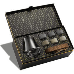The Connoisseur's Set - Nosing Whiskey Glass Edition is a collection of high-quality whiskey stones and a nosing glass for an enhanced whiskey tasting experience. The set includes a variety of smooth, chilled stones and a specialized glass designed to capture the aroma and flavor of premium whiskeys.