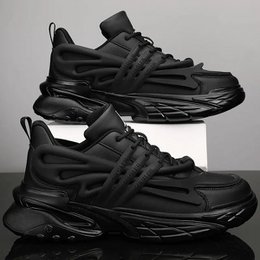  Black unisex sneakers with chunky sole, lace-up closure, modern athletic style design.