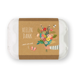  Egg box with 6 flower marbles - Thank you. Colorful floral bouquet with various flowers and greenery. Suitable for planting seeds or decorative purposes.