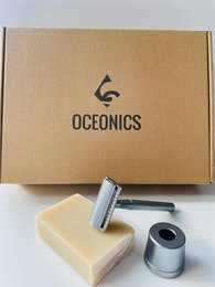 Chrome safety razor with Oceonics branding, suitable for hair removal.