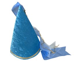  Tall, cone-shaped party hat made of blue velvet with a crown-like design and decorative ribbons.