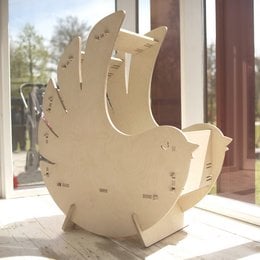 Wooden bird-shaped cradle with a 40 x 80 cm mattress, suitable for use as a baby highchair.