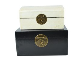 Set of decorative boxes with a vintage, antique style. The boxes feature a wooden construction with a black and white color scheme, and decorative metal hardware. The boxes appear to be used for storage or display purposes.